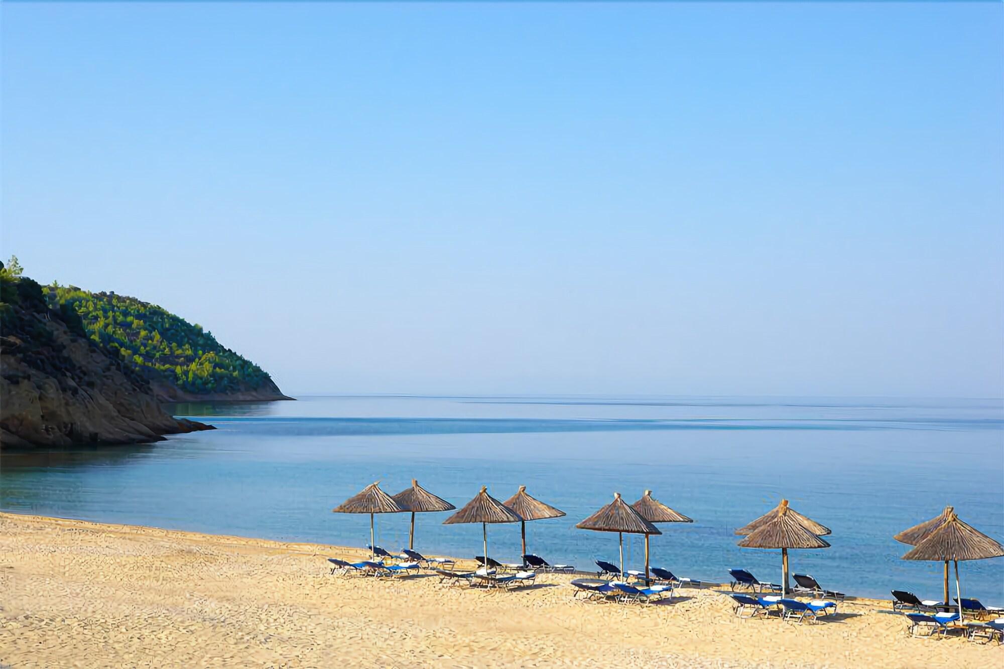 Kamari Beach Hotel Potos Bagian luar foto